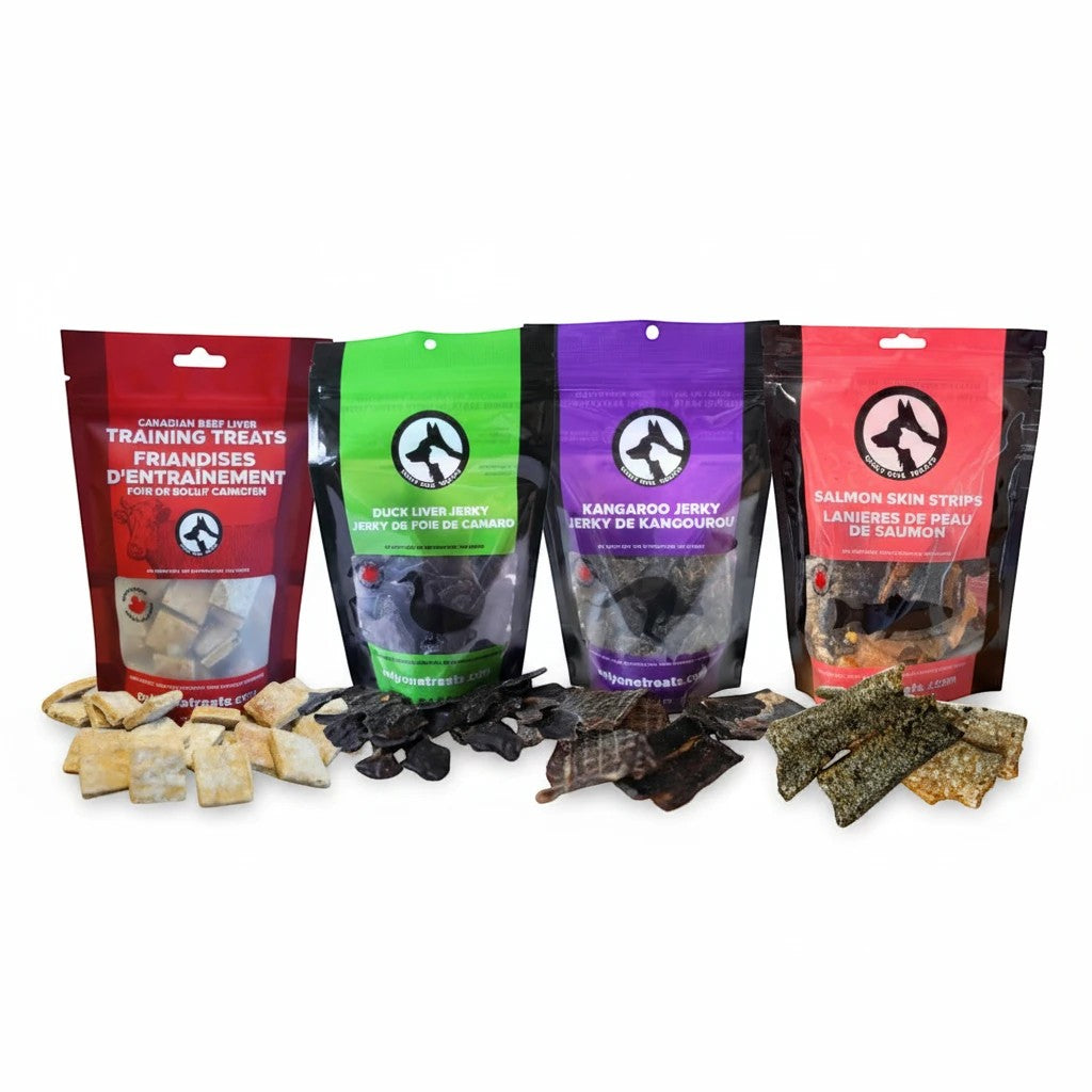 Oh Canada Gifts From Our Kitchen Box featuring four bags of assorted Canadian-made single-ingredient pet treats.