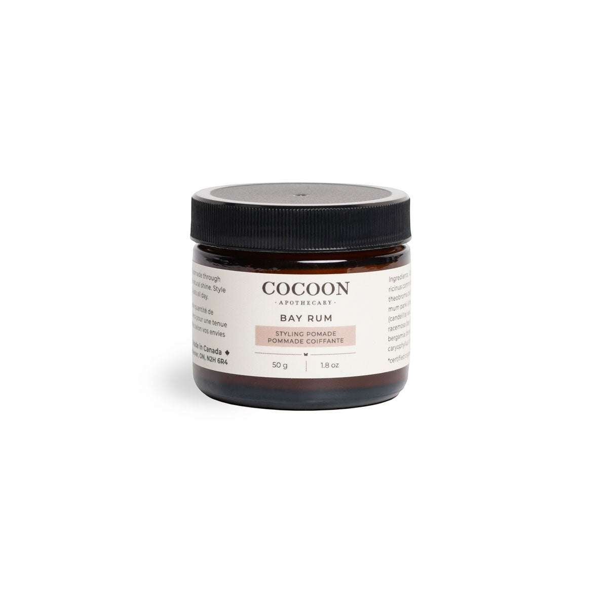 Oh Canada Gifts Cocoon Apothecary Bay Rum styling pomade in a small amber glass jar with a black lid.