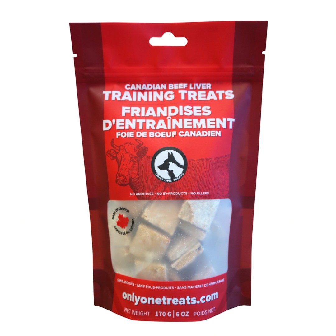 Oh Canada Gifts beef liver training treats in a red resealable pouch with a clear window showing soft biscuit pieces.