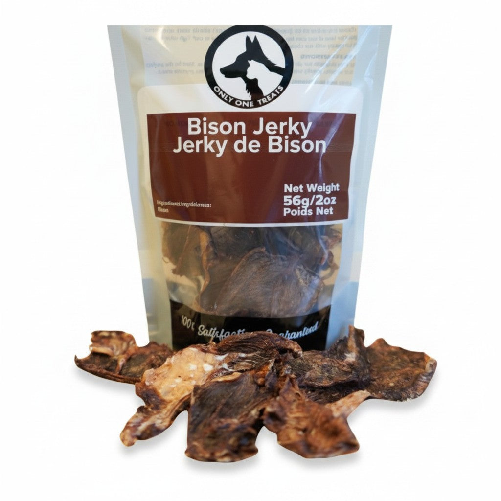 Oh Canada Gifts 56g bag of slow-cooked Canadian bison jerky dog treats with pieces displayed in front.