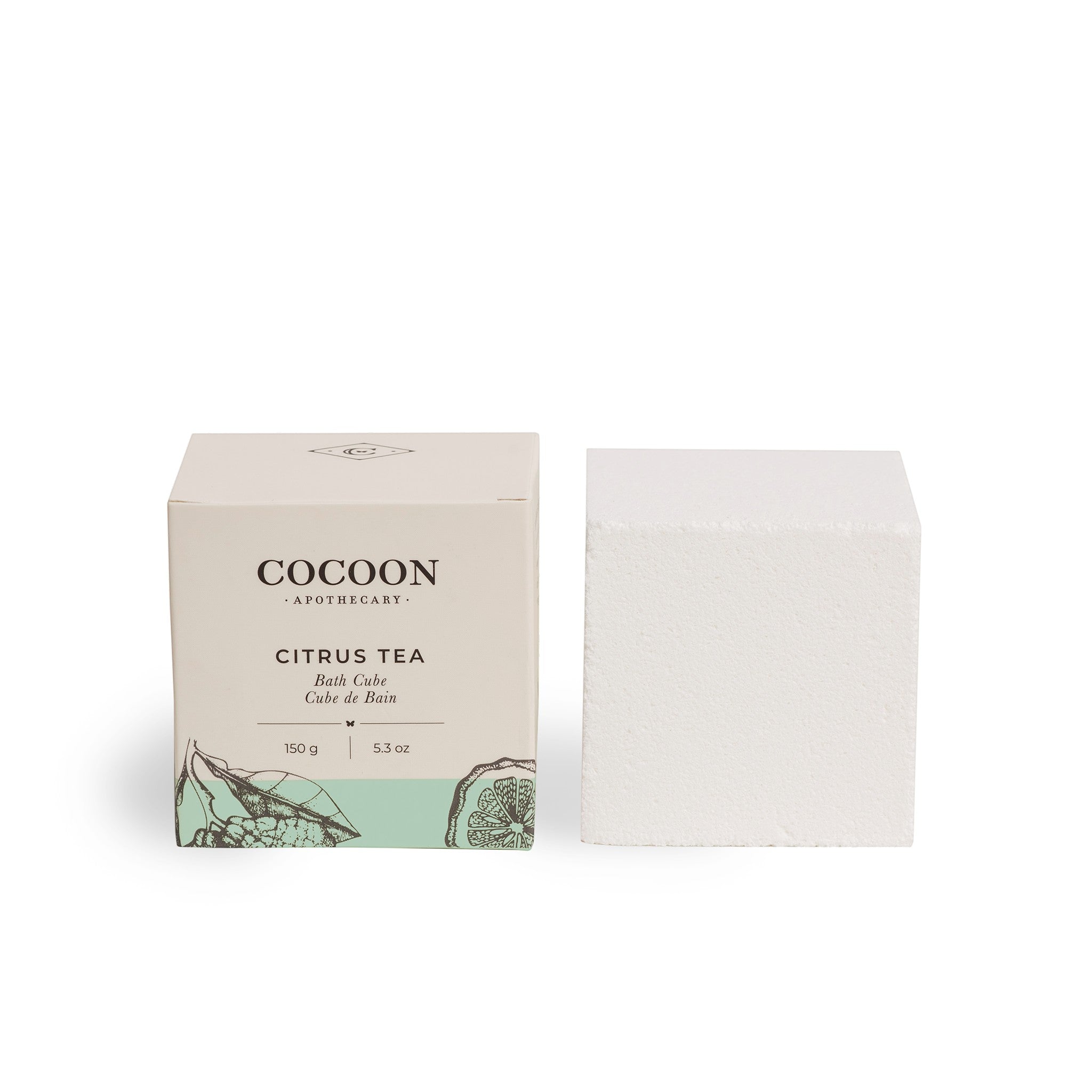 Oh Canada Gifts Citrus Tea bath cube beside its minimalist beige and mint green product box.