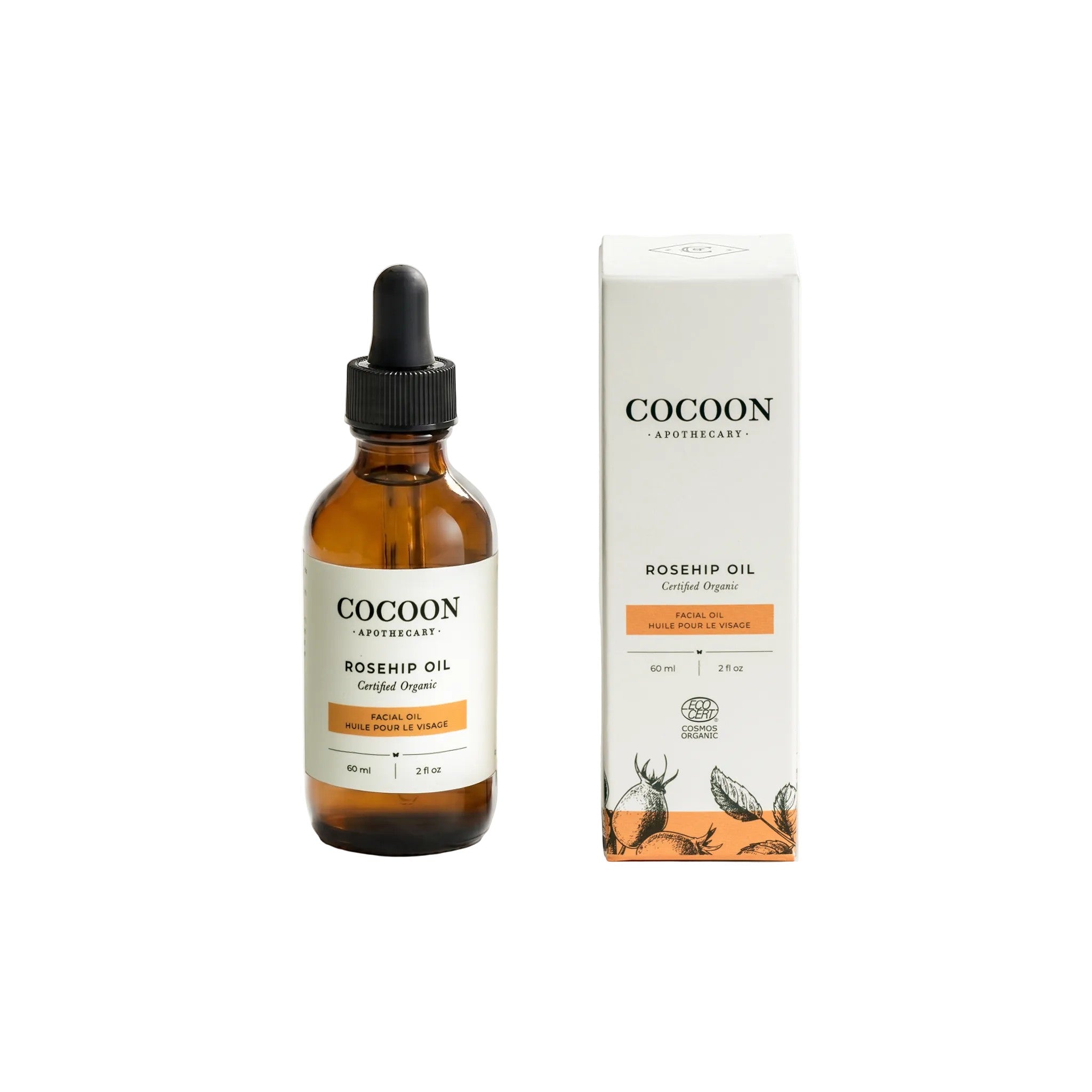 Oh Canada Gifts Cocoon Apothecary organic rosehip facial oil in an amber glass dropper bottle with its product box.