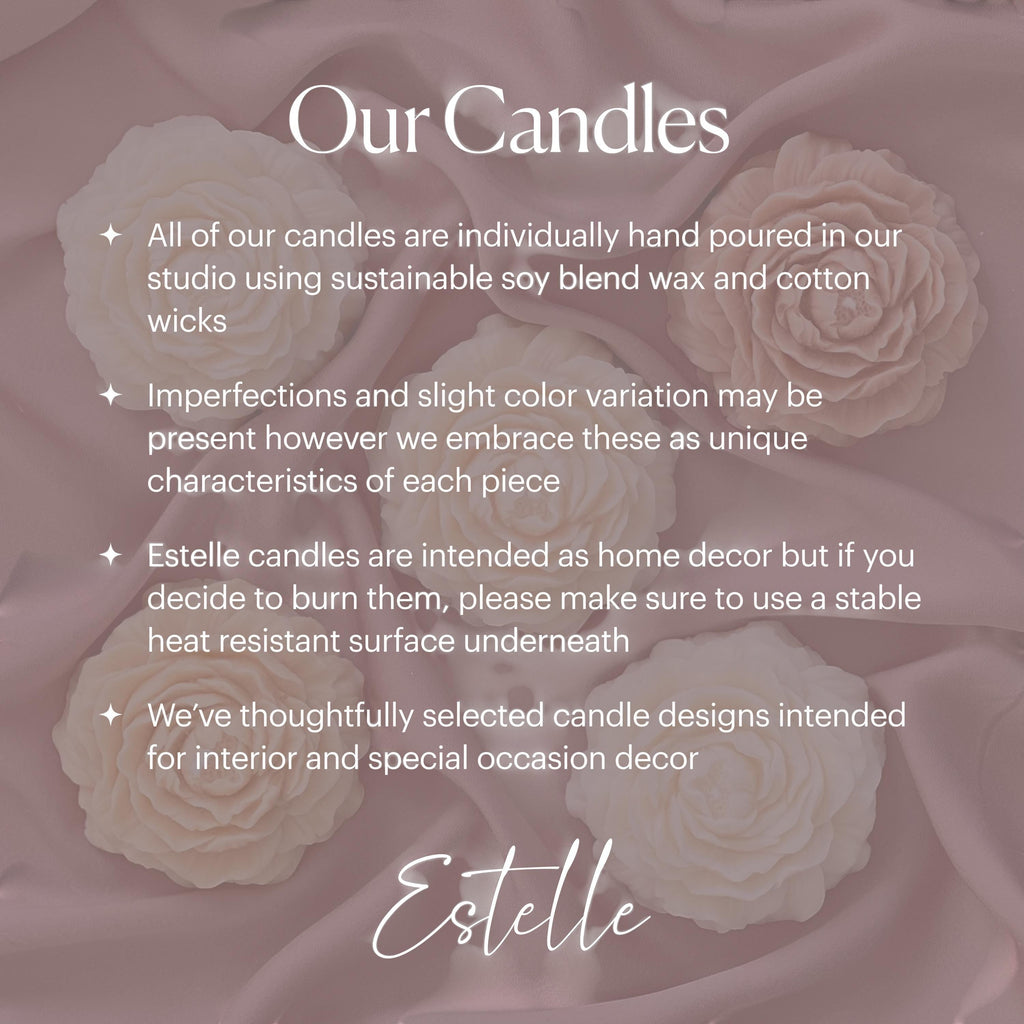 Oh Canada Gifts artisan croissant-shaped soy wax candle with a sculptural design on a soft fabric background