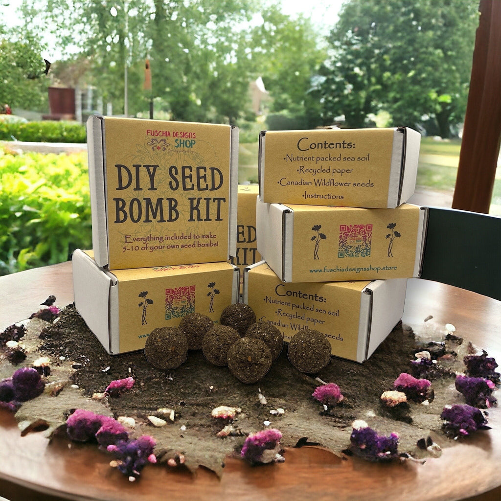 Oh Canada Gifts DIY seed bomb kit with recycled paper, sea soil, and Canadian wildflower seeds on a wooden table.