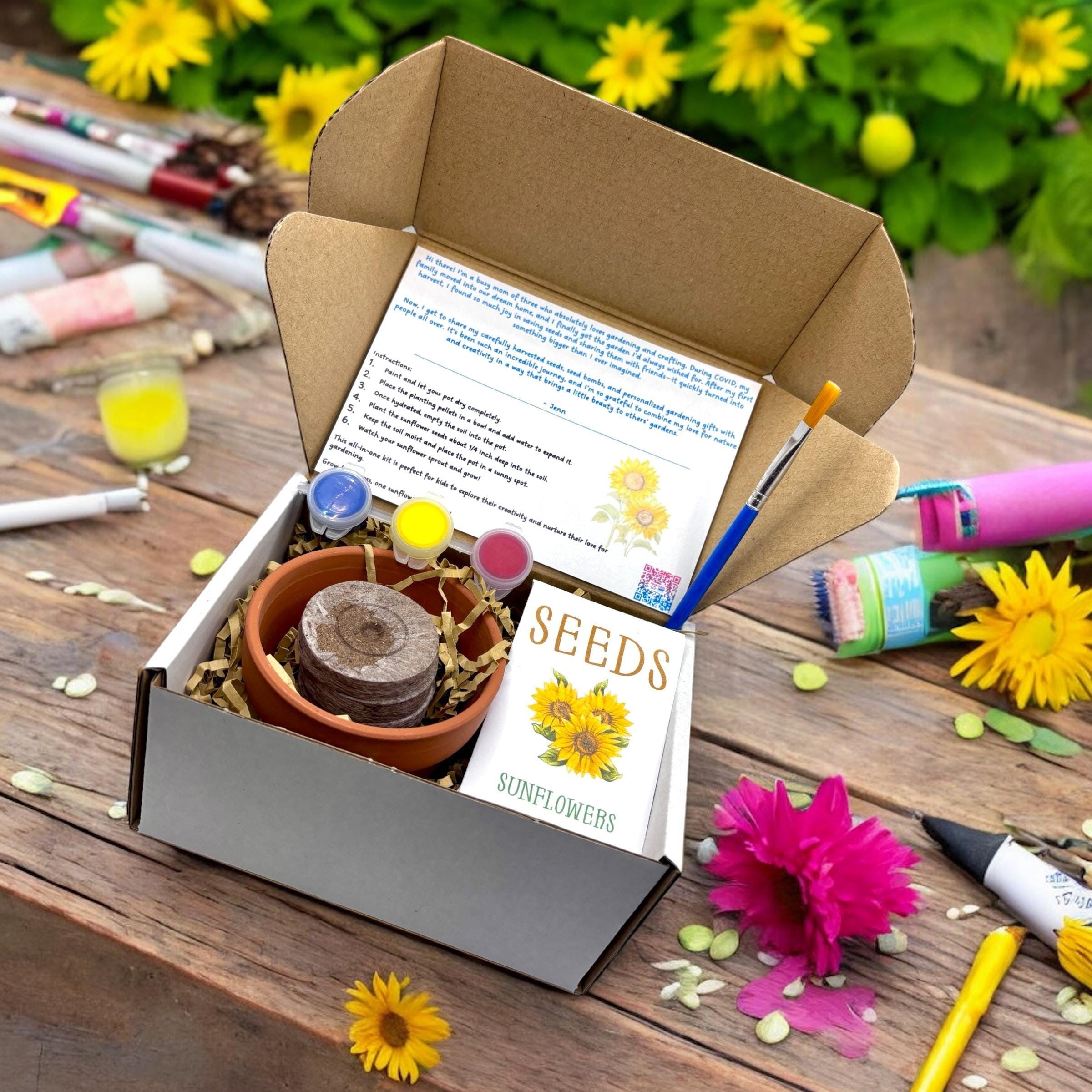 Oh Canada Gifts Paint, Plant & Grow DIY kit with clay pot, sunflower seeds, paints, and brush in a cardboard box