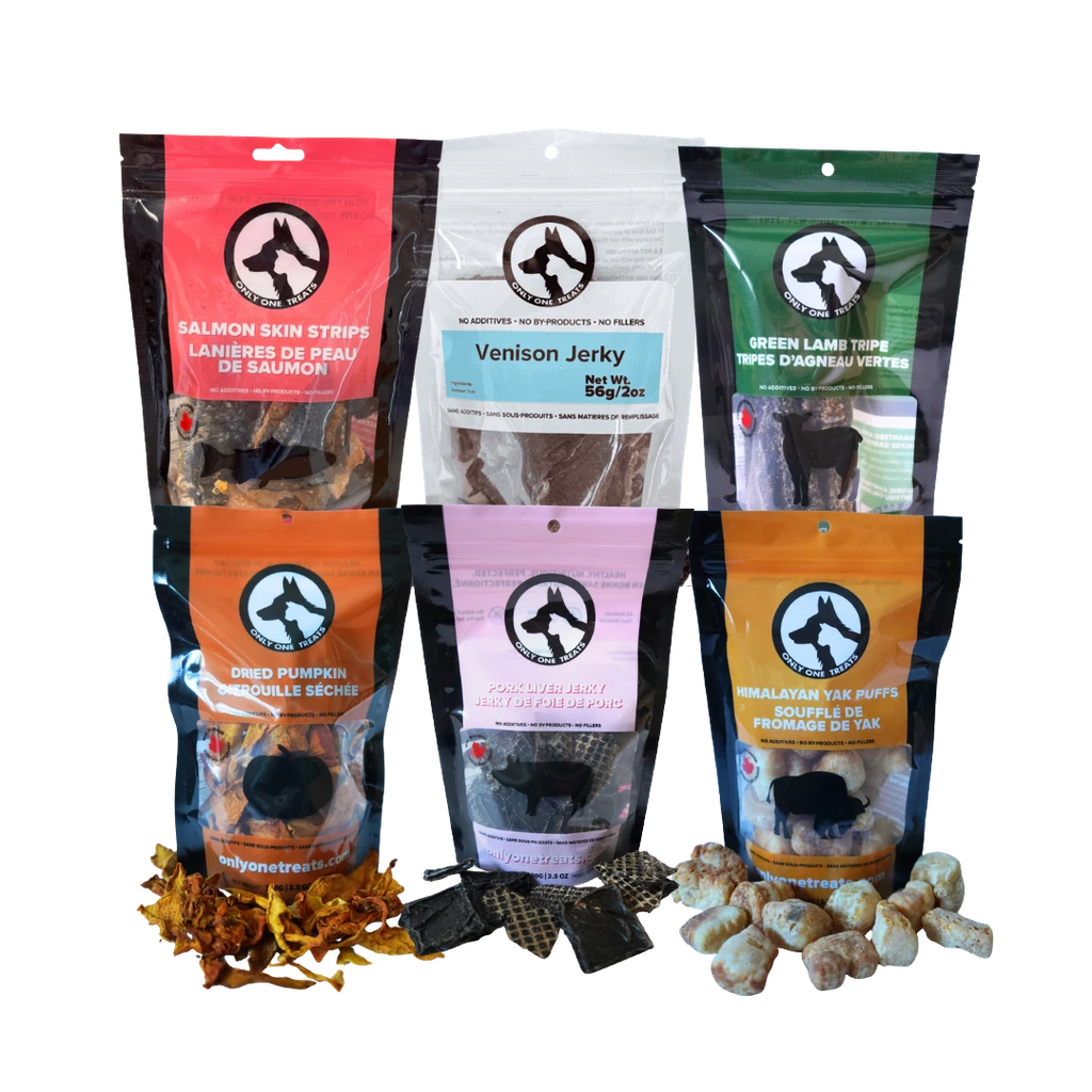 Oh Canada Gifts Charcuterie Treat Box featuring assorted Canadian-made jerky, freeze-dried, and dried dog treats.