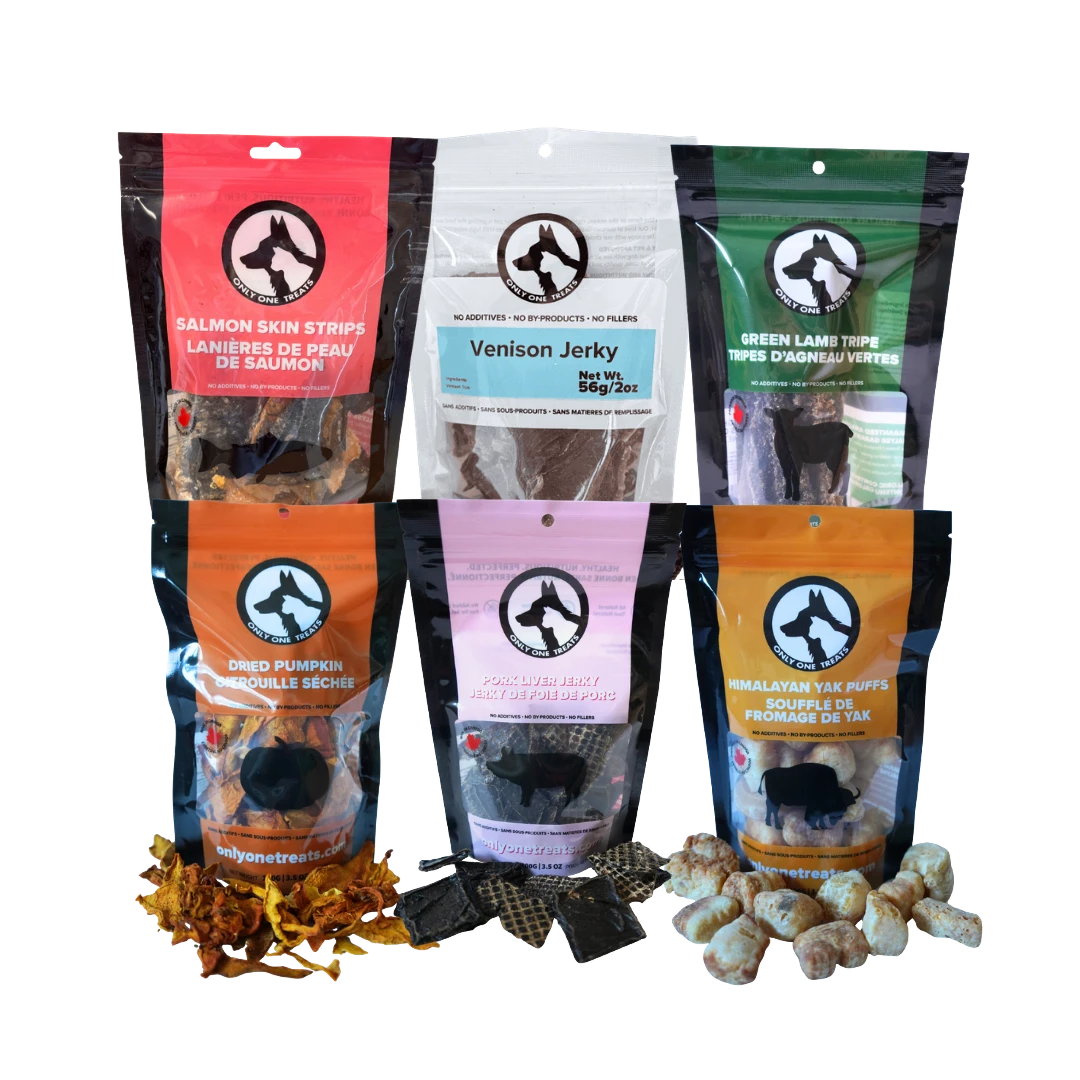 Oh Canada Gifts Charcuterie Treat Box featuring assorted Canadian-made jerky, freeze-dried, and dried dog treats.