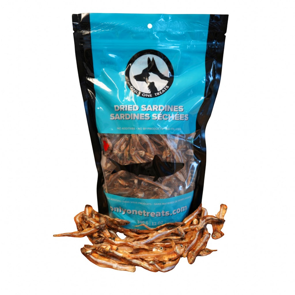 Oh Canada Gifts dried sardines for dogs and cats in a 340g resealable bag with whole fish treats in front.