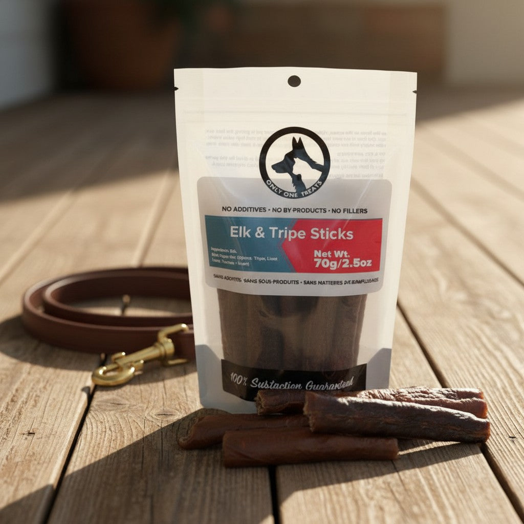 Oh Canada Gifts Elk and Beef Tripe Sticks dog treat pouch with air-dried meat chews on a wooden surface.