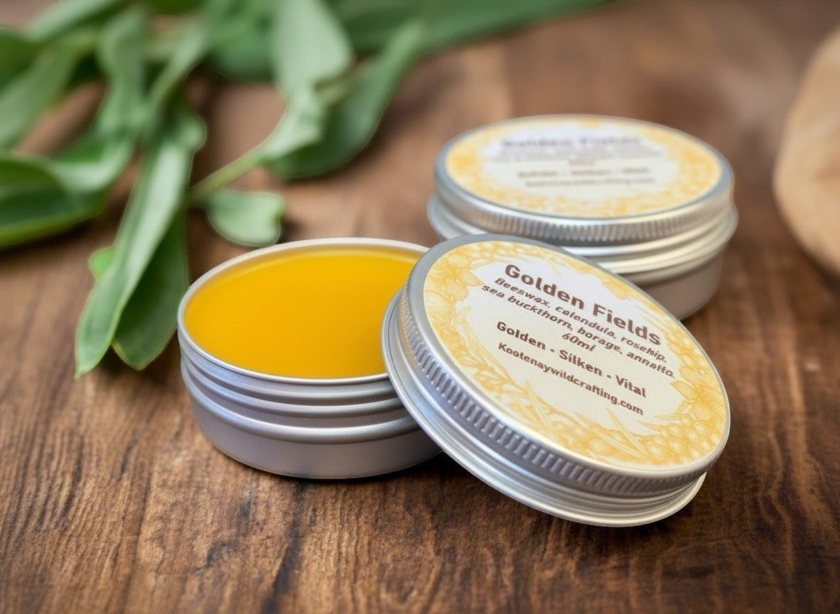 Oh Canada Gifts Golden Fields herbal skin salve in a small metal tin with a golden calendula-infused balm.