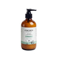 Oh Canada Gifts Cocoon Apothecary Kahuna body lotion in an amber glass bottle with a black pump dispenser