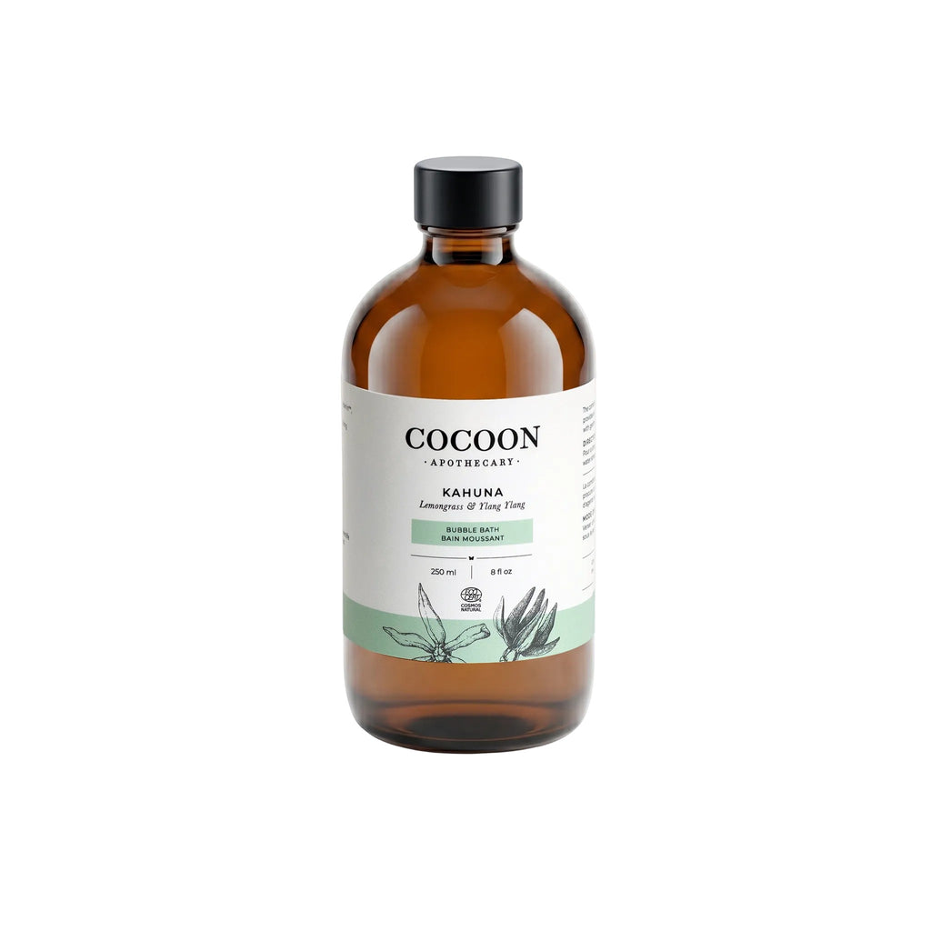 Oh Canada Gifts Cocoon Apothecary Kahuna bubble bath in an amber glass bottle with a minimalist label.
