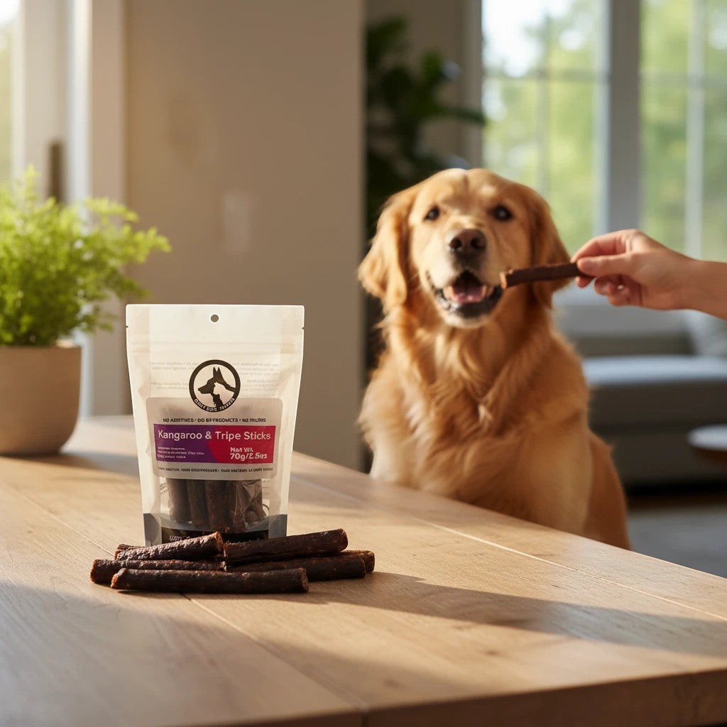 Oh Canada Gifts kangaroo and beef tripe dog treat sticks in a pouch with a golden retriever waiting for a snack
