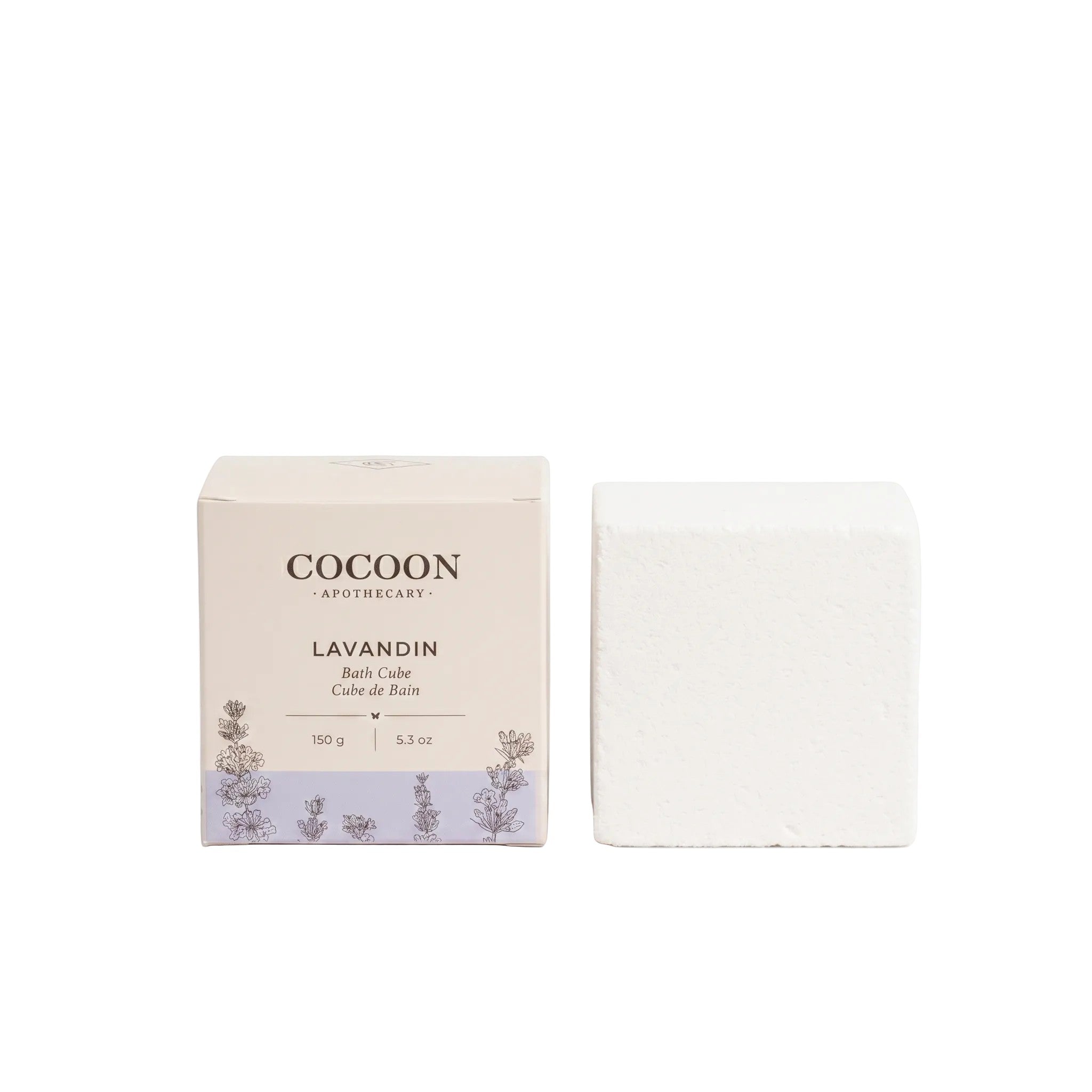 Oh Canada Gifts Lavandin Bath Cube in white packaging with botanical illustrations, next to a single white bath cube.