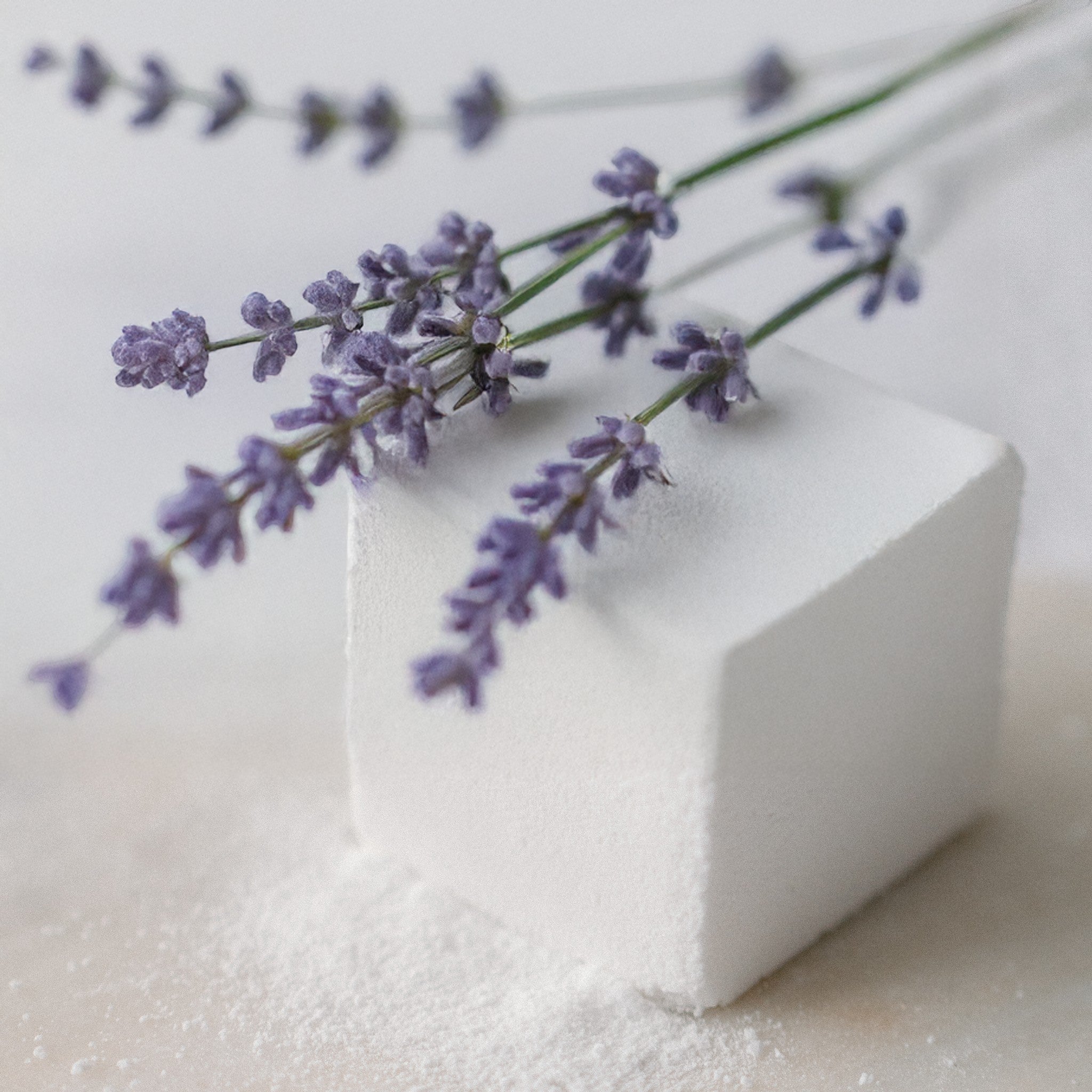 Oh Canada Gifts white lavandin bath cube with fresh lavender sprigs on a light surface