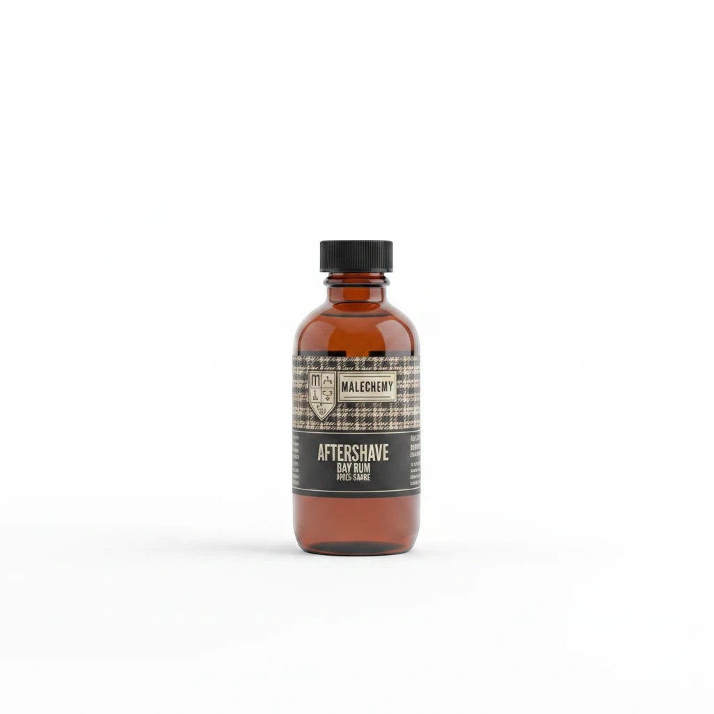 Oh Canada Gifts Malechemy Bay Rum aftershave in an amber glass bottle with a vintage-style plaid label.
