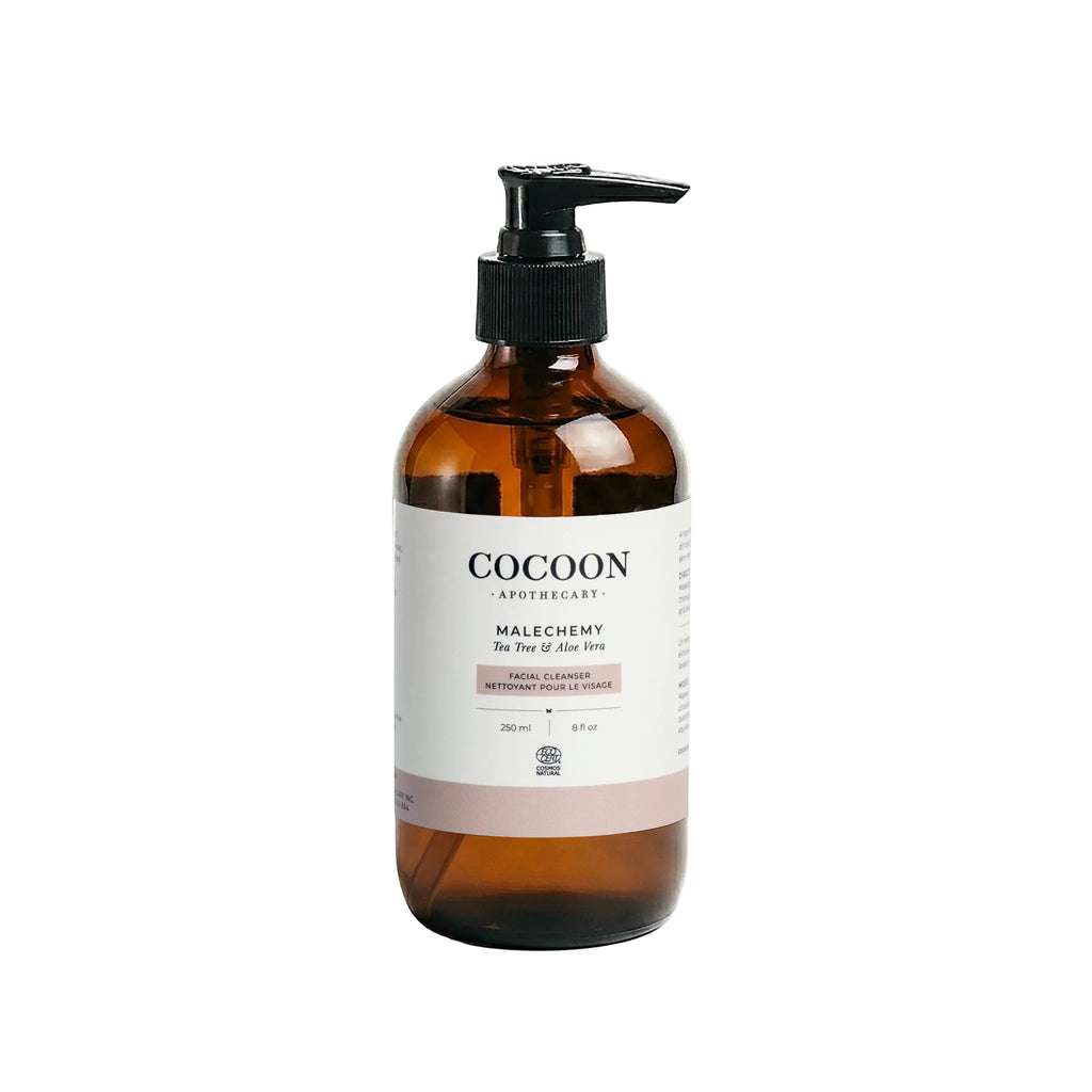 Oh Canada Gifts Malechemy facial cleanser in an amber glass bottle with a black pump dispenser.