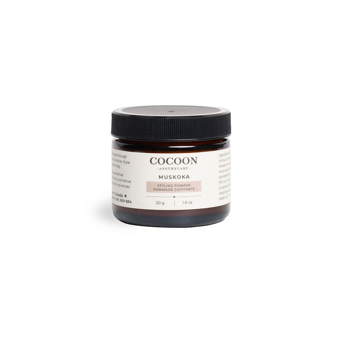 Oh Canada Gifts Muskoka Styling Pomade in a brown glass jar with a black lid, featuring a plant-based formula.