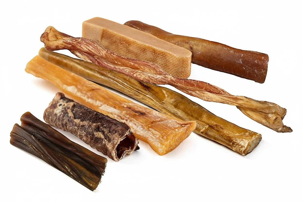 Oh Canada Gifts Ultimate Chew Box featuring a variety of natural Canadian-made dog chews including tendons and skin rolls.