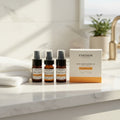 Oh Canada Gifts Cocoon Apothecary oily skin starter kit with three travel-size bottles and a product box on a counter.