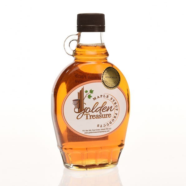 Oh Canada Gifts organic amber maple syrup in a classic glass jug with a decorative label