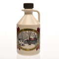 Oh Canada Gifts organic maple syrup in a lightweight plastic jug with a label featuring a Canadian sugar shack scene.