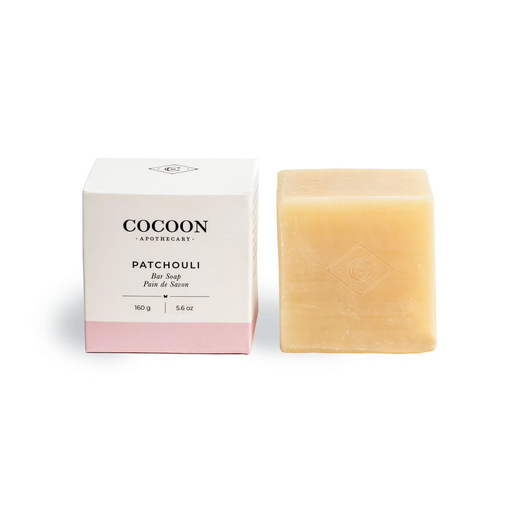 Oh Canada Gifts Cocoon Apothecary Patchouli bar soap with its minimalist white and pink packaging box.