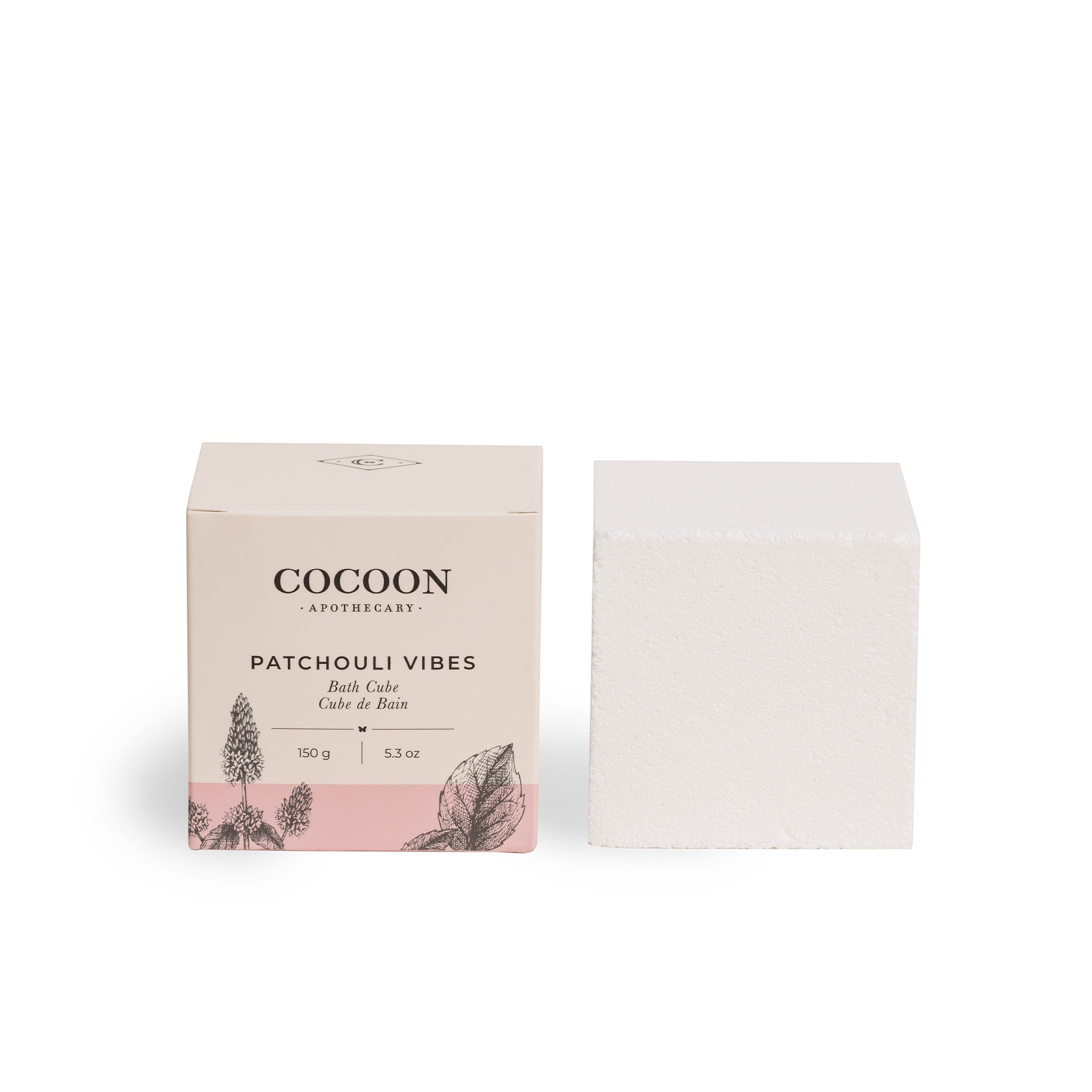 Oh Canada Gifts Patchouli Vibes bath cube next to its beige botanical-themed packaging box