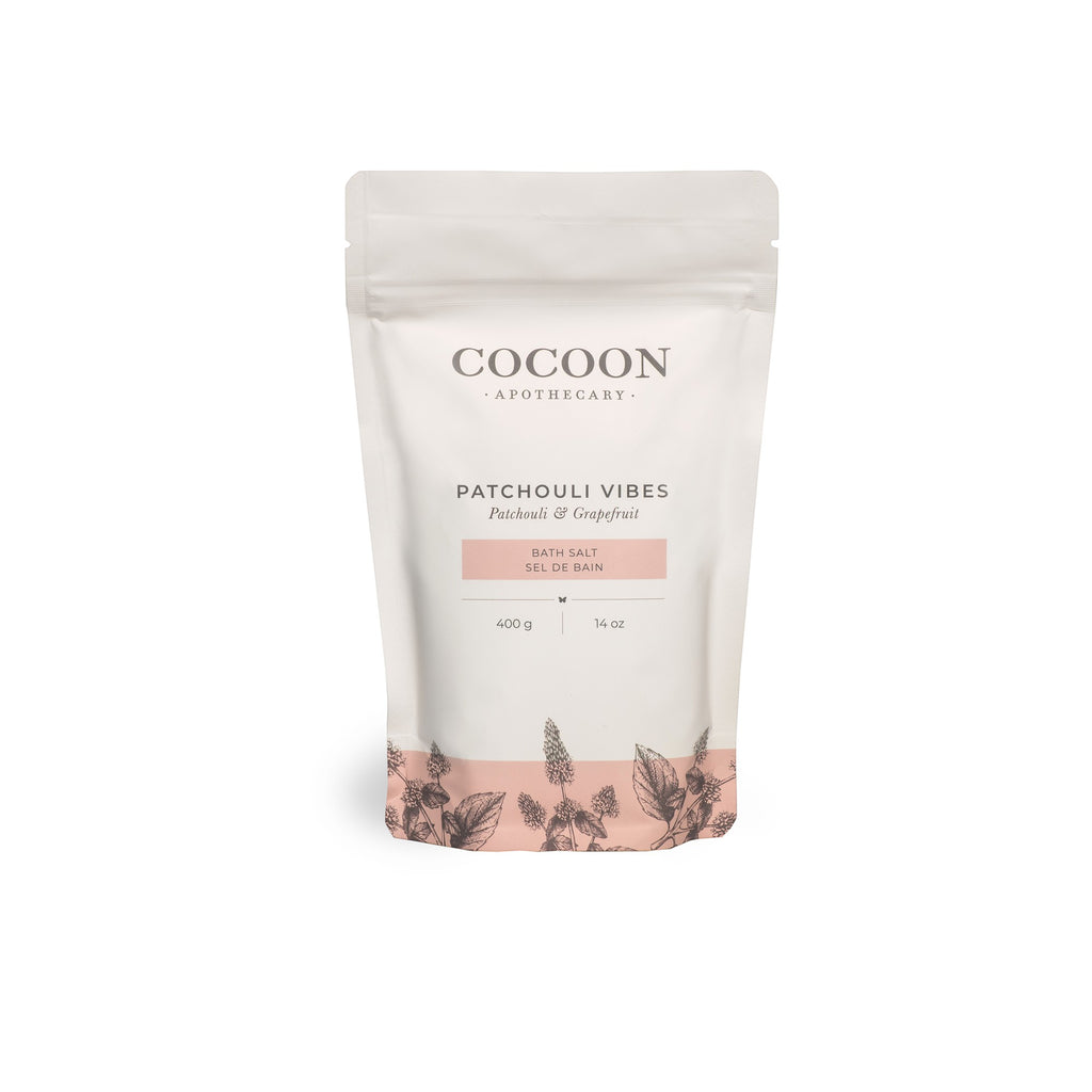 Oh Canada Gifts Patchouli Vibes bath salts in a white 400g pouch with botanical illustrations and minimalist design.