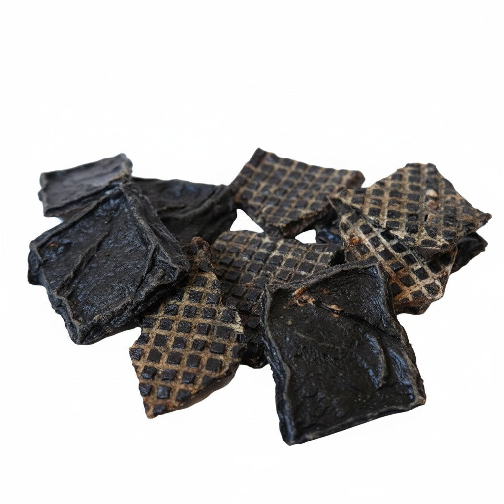 Oh Canada Gifts pork liver jerky treats with a distinct grid texture, slow-cooked and high in protein for dogs.