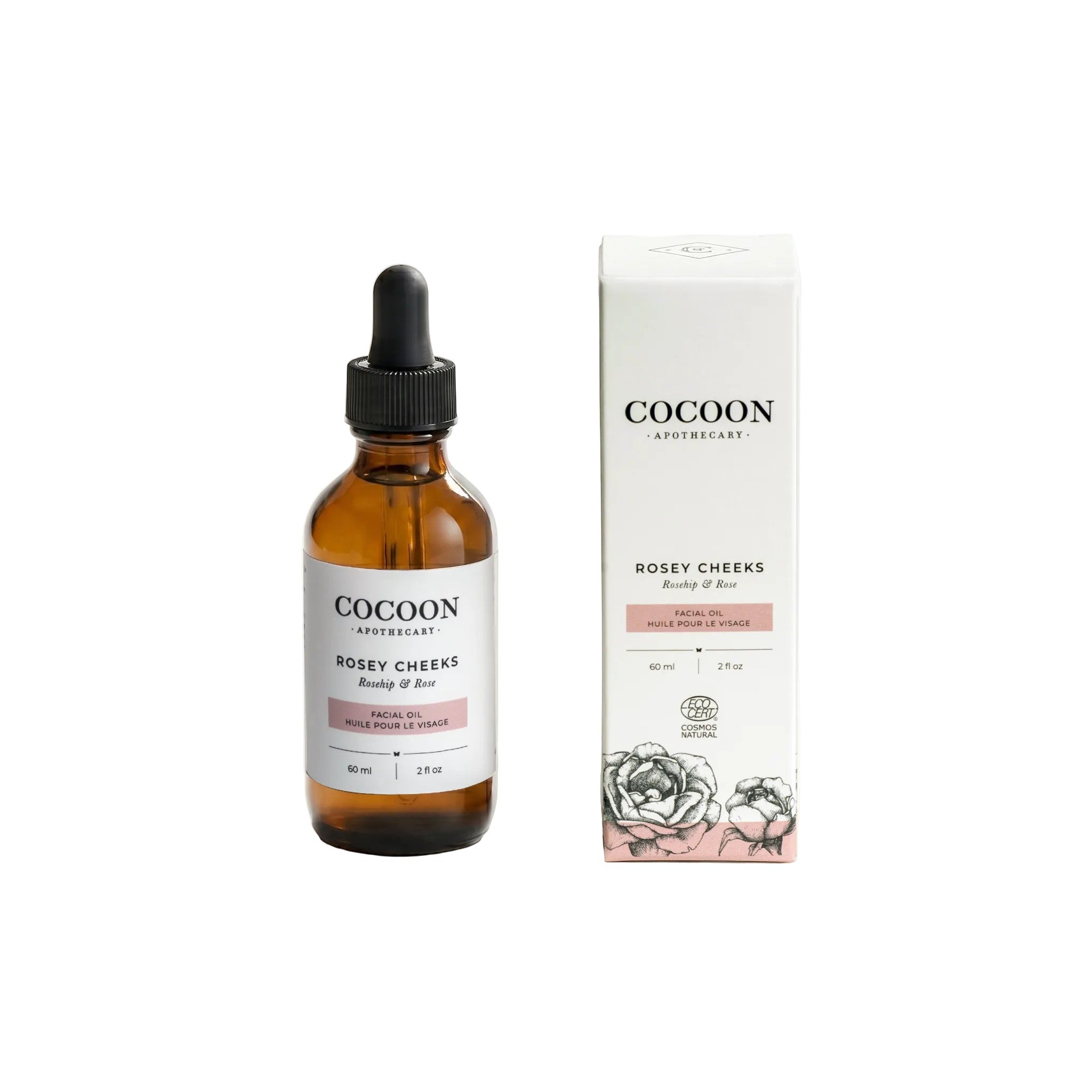 Oh Canada Gifts Cocoon Apothecary Rosey Cheeks facial oil bottle and box with rosehip and rose botanical design.