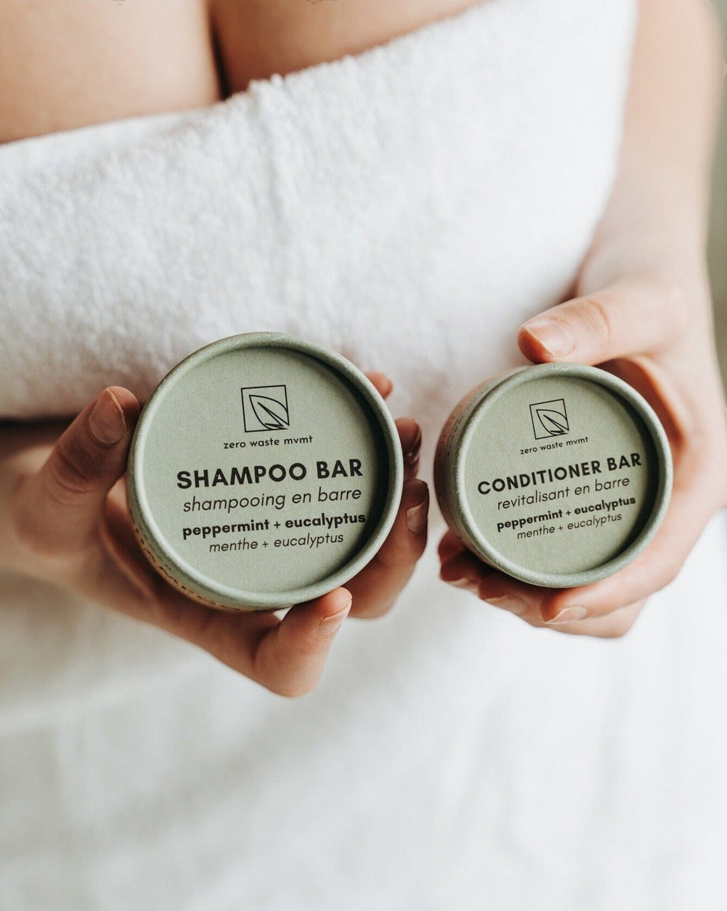 Oh Canada Gifts zero-waste peppermint and eucalyptus shampoo and conditioner bars in round sustainable paper packaging.