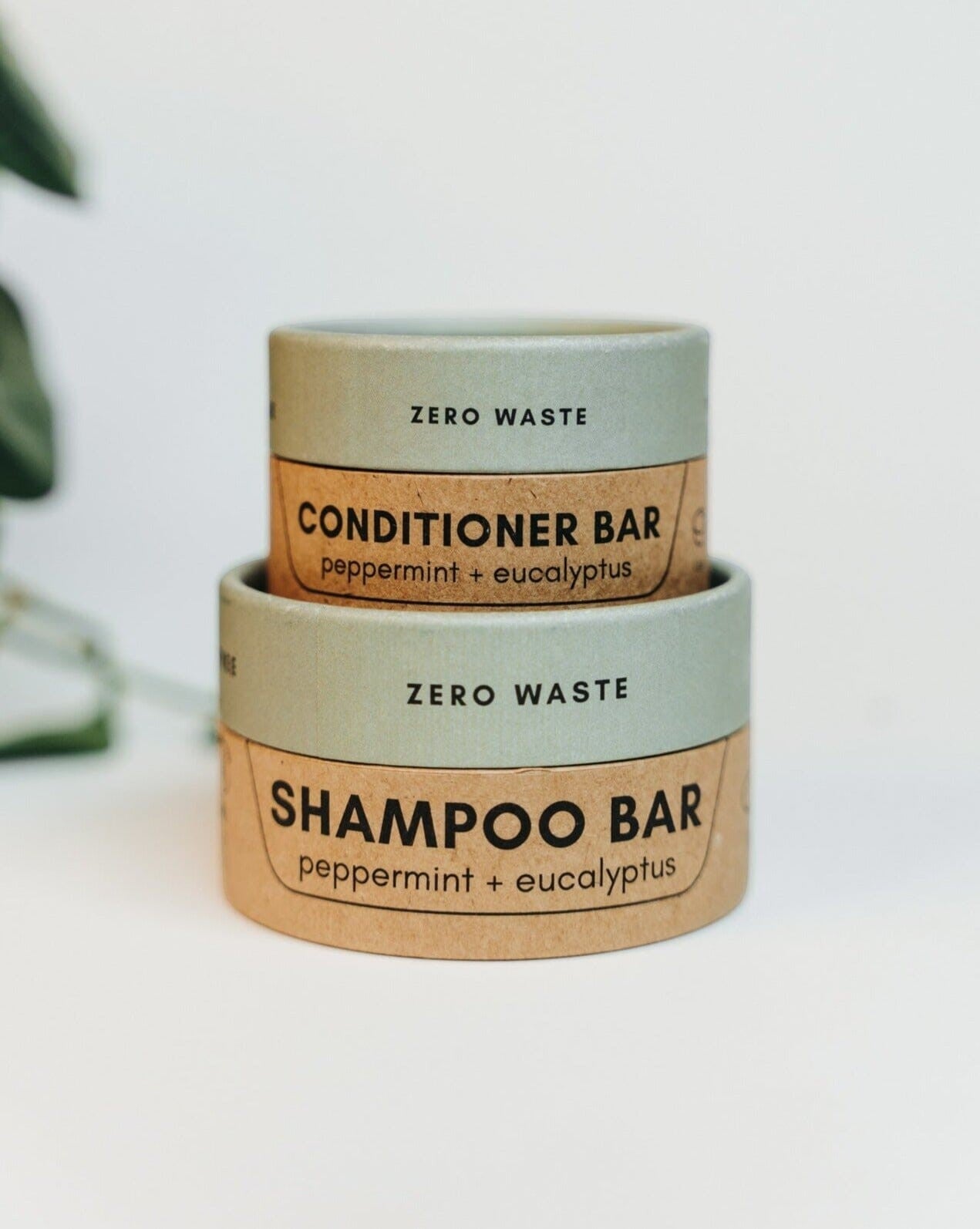 Oh Canada Gifts zero-waste peppermint and eucalyptus shampoo and conditioner bars in sustainable paper packaging.