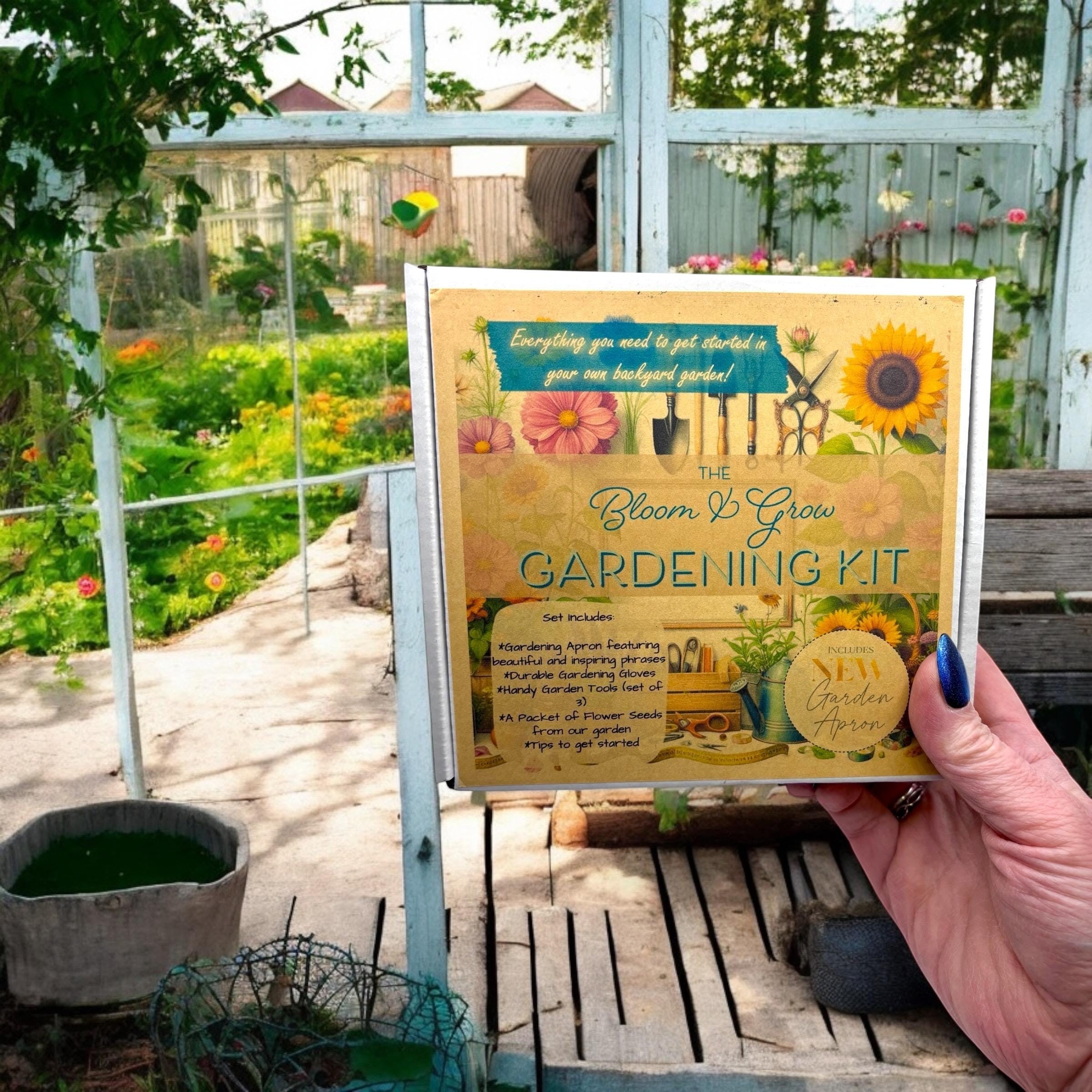 Oh Canada Gifts Bloom and Grow gardening kit box held in hand in front of a sunny greenhouse garden background.
