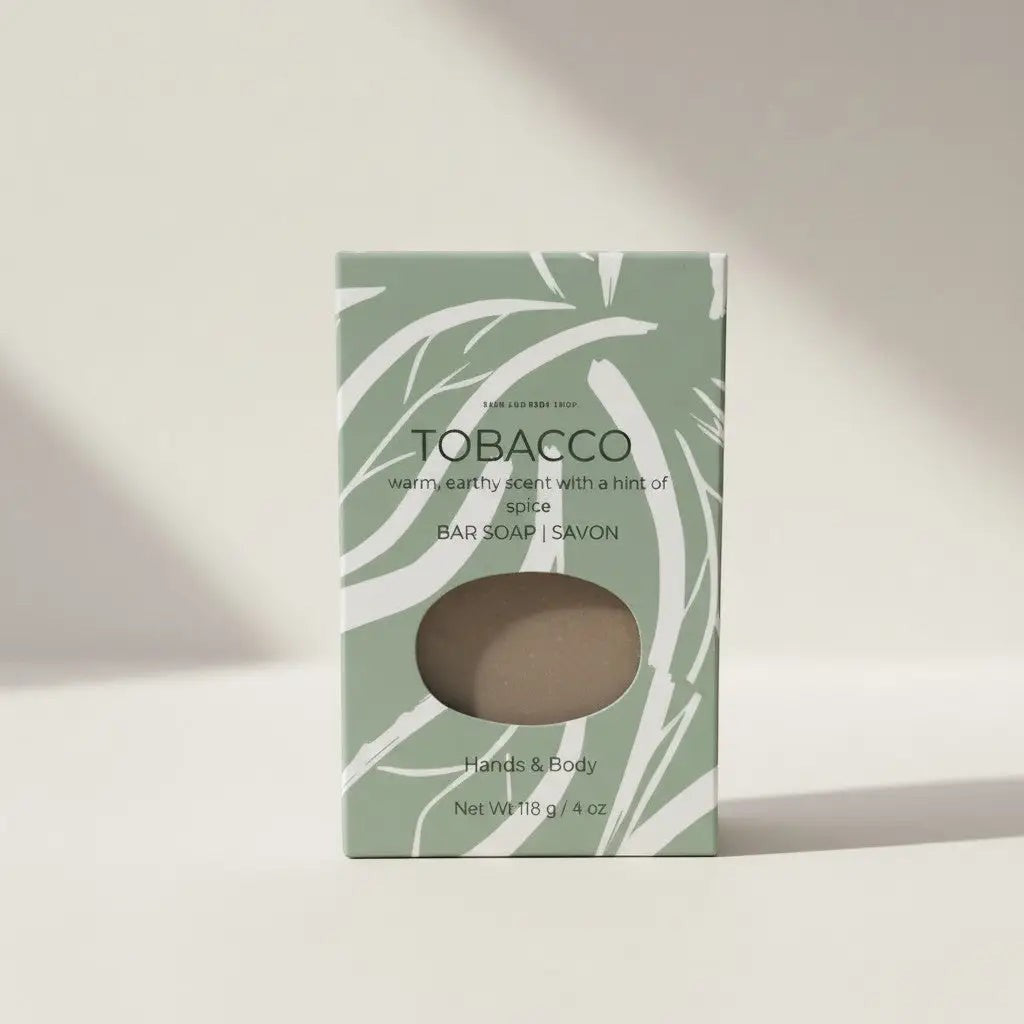 Oh Canada Gifts tobacco leaf bar soap in sage green packaging with white botanical leaf illustrations.