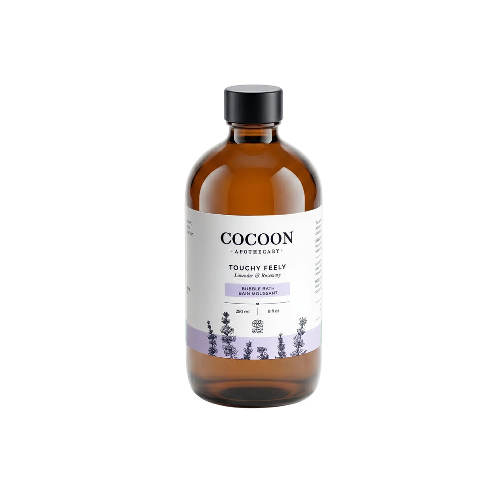 Oh Canada Gifts Touchy Feely bubble bath in an amber glass bottle with lavender and rosemary essential oils.