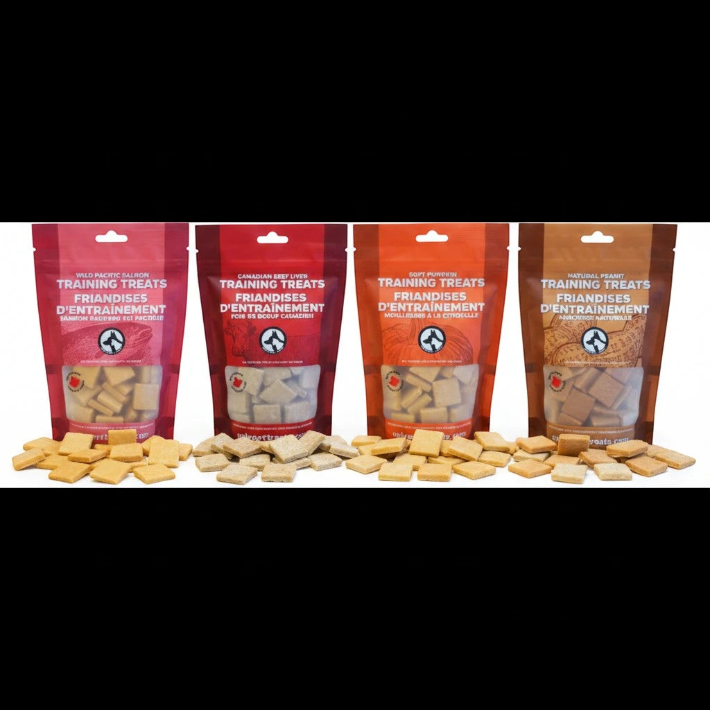 Oh Canada Gifts training treat variety box featuring four bags of soft Canadian-made dog treats in assorted flavours.