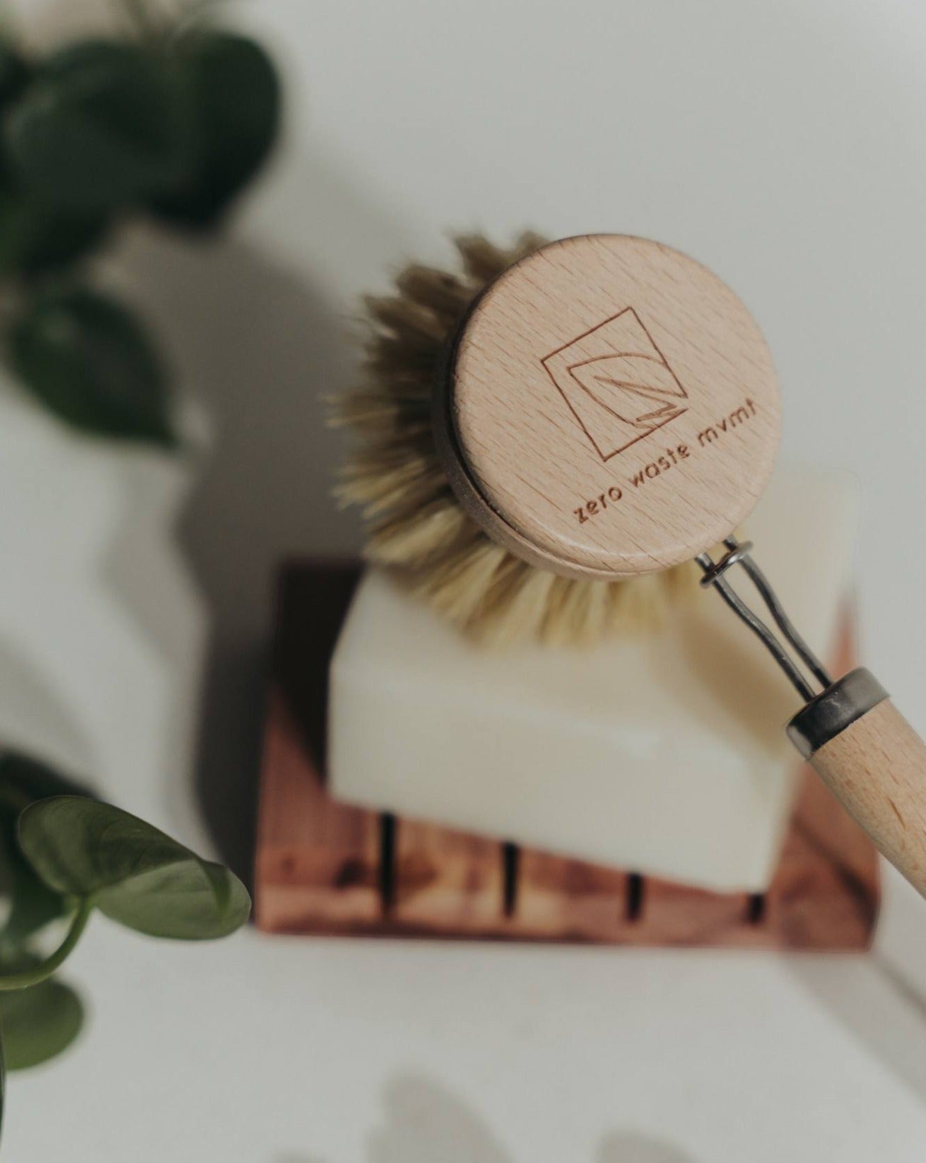 Oh Canada Gifts unscented solid dish soap bar with a wooden dish brush on a cedar tray for zero waste cleaning.