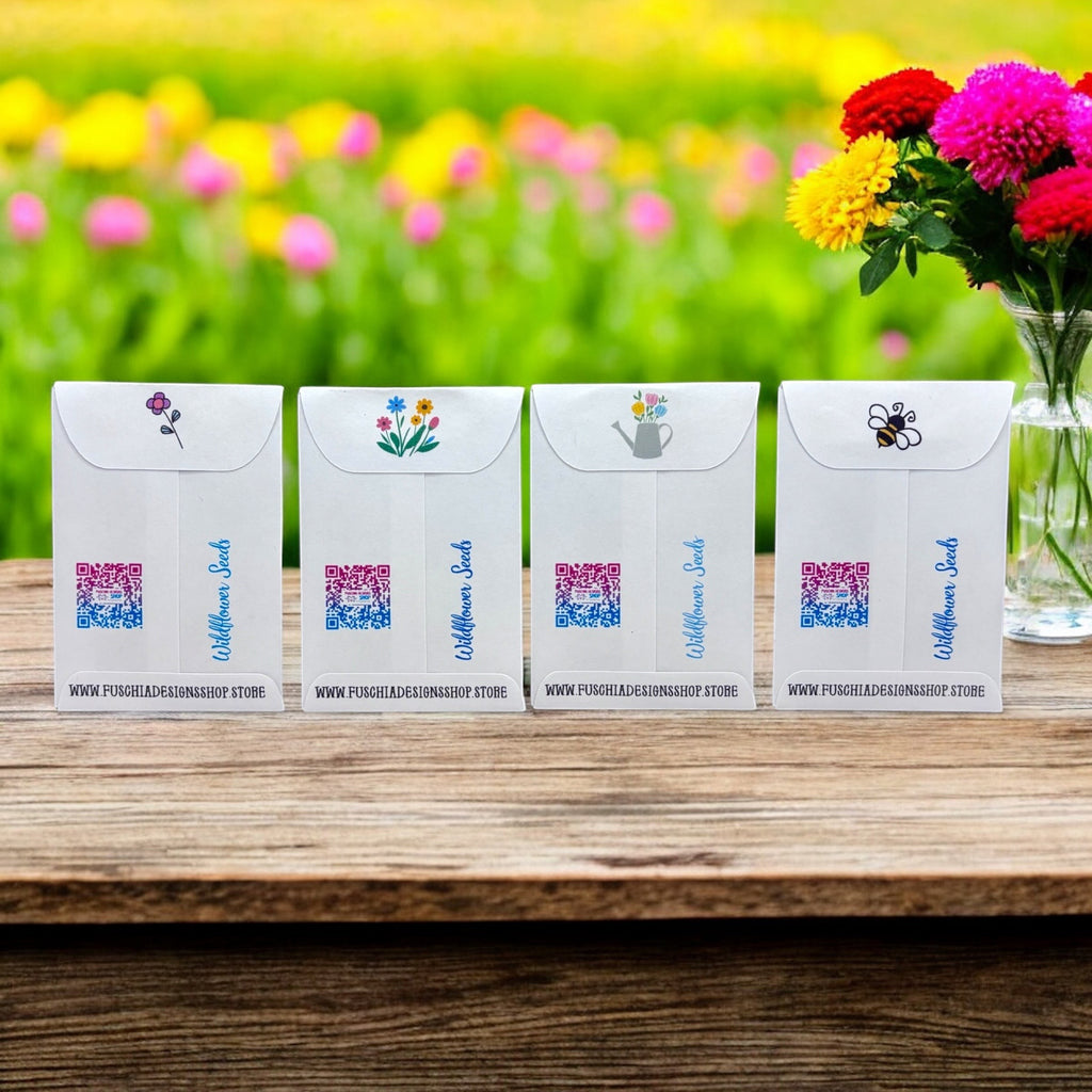 Oh Canada Gifts wildflower seed packets with floral illustrations on a wooden table in a garden setting.