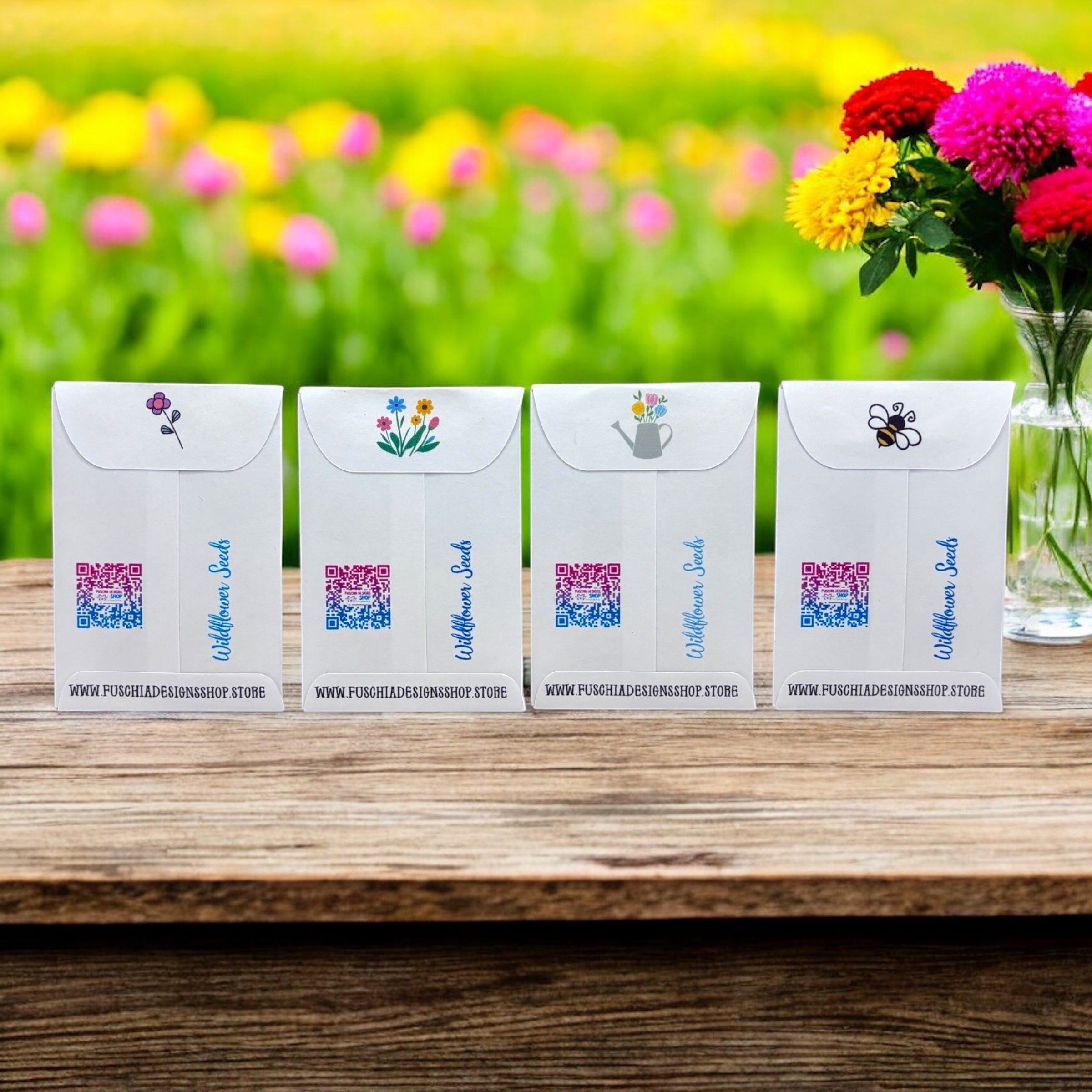Oh Canada Gifts wildflower seed packets with floral illustrations on a wooden table in a garden setting.